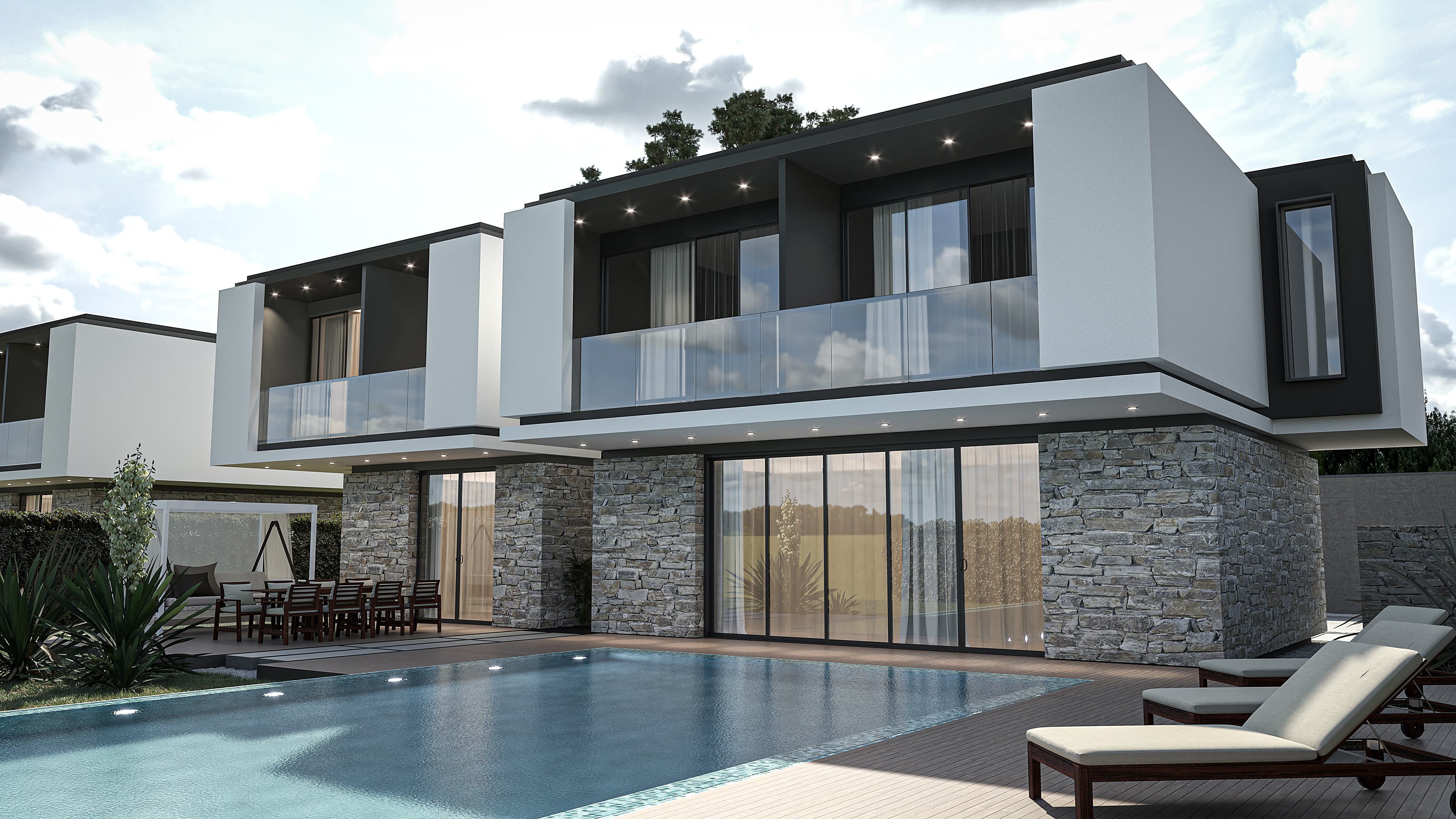 Poolside terrace with stone and white rendered facades and glass balustrades