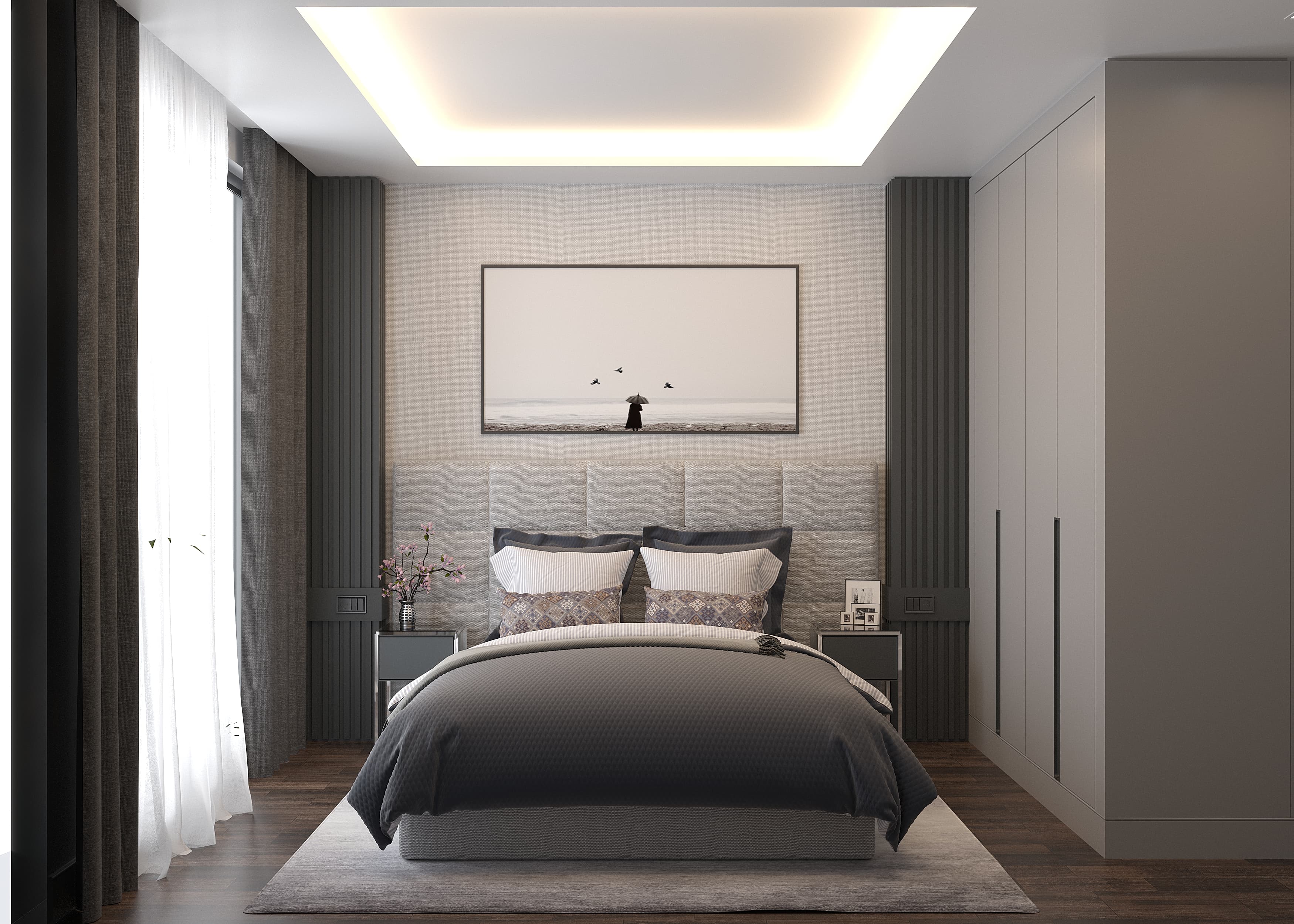 Guest bedroom with upholstered headboard, artwork and cove lighting