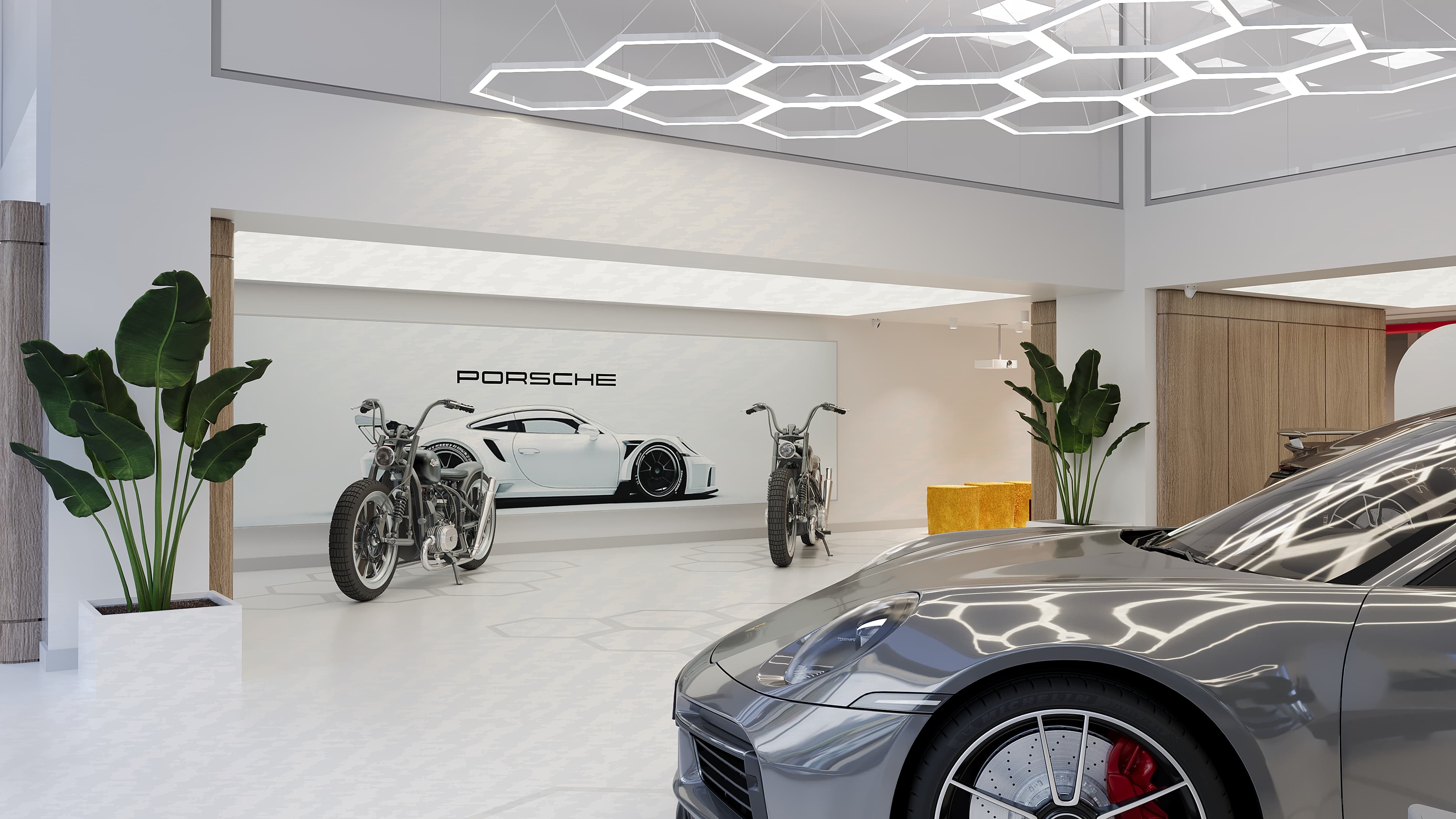 Porsche branding wall with motorcycles on display