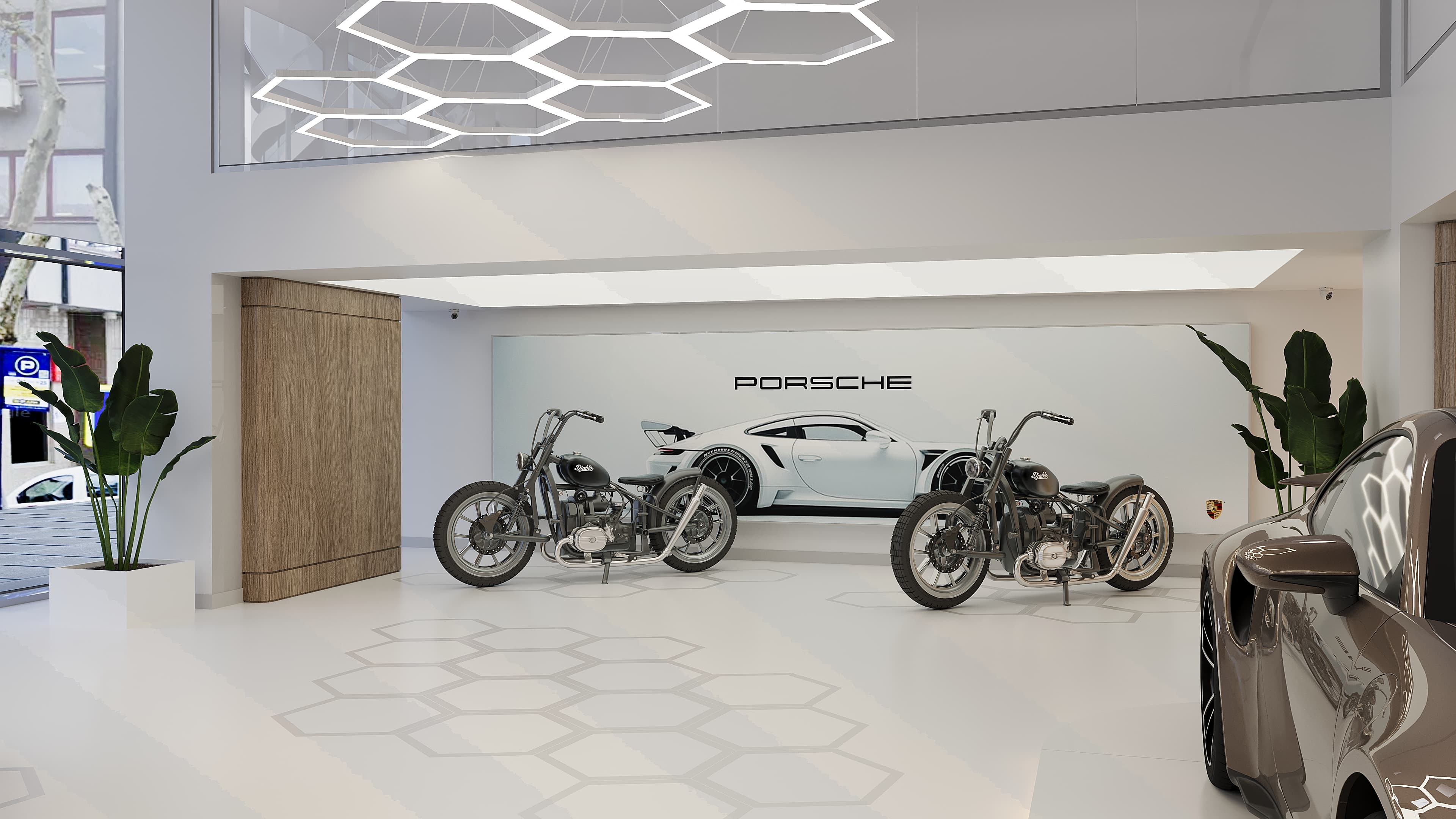 Motorcycles displayed beneath Porsche wall art