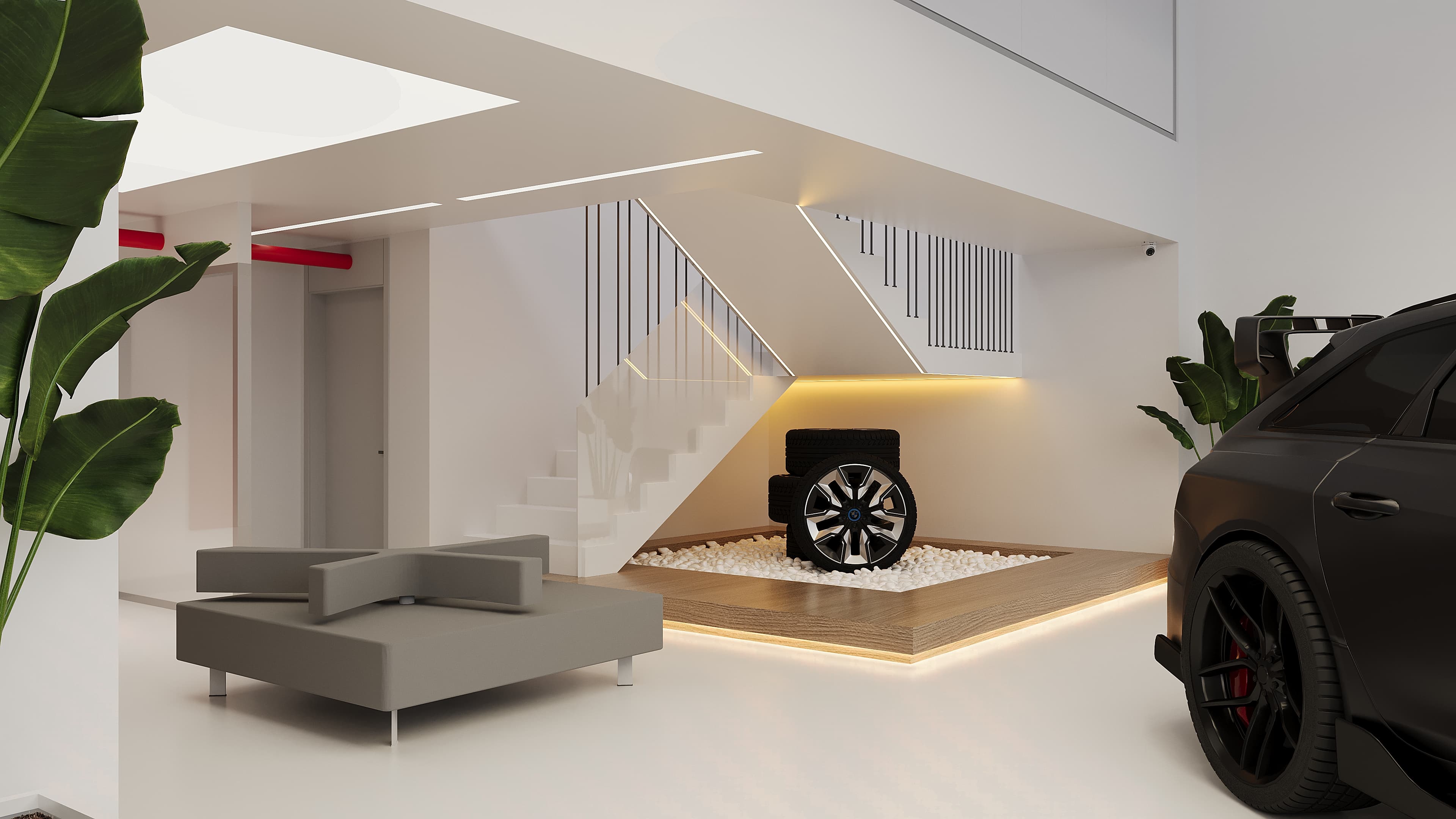 Staircase area with tyre display rack and lounge sofa