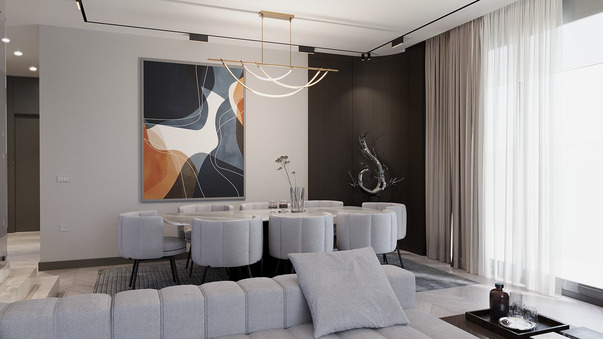 Dining area with abstract painting, gold chandelier and grey chairs