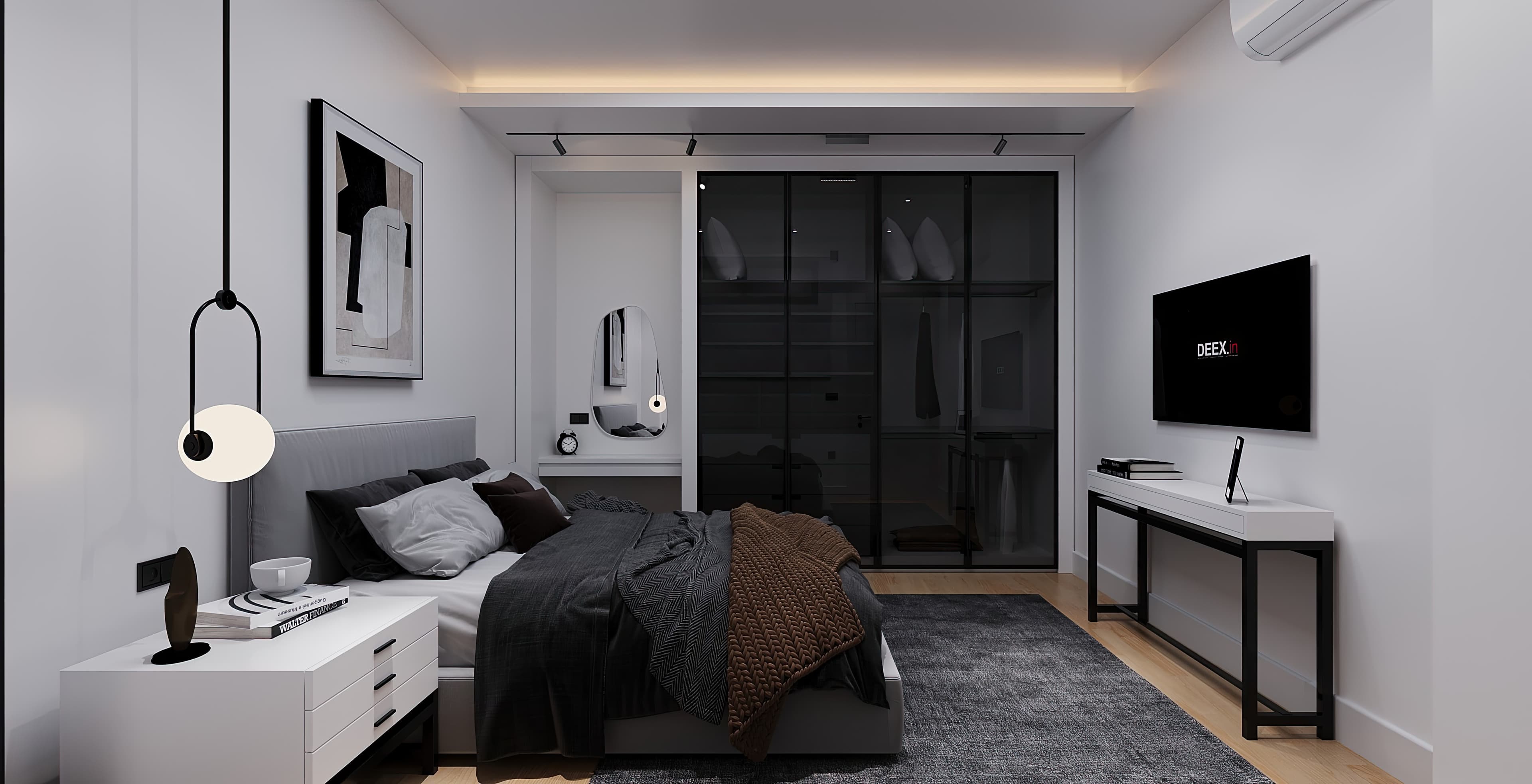 Masculine guest bedroom with dark bedding, abstract art, and glass wardrobe